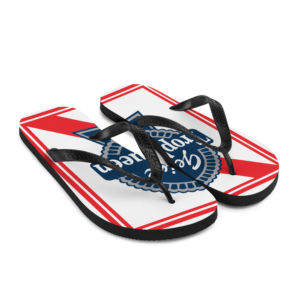 Prepare for an adventurous and carefree summer with a pair of colorful Trophy Queen Blue Ribbon logo with rubber soles and soft fabric lining these flip flops are sure to make you feel comfortable wherever your day takes you.