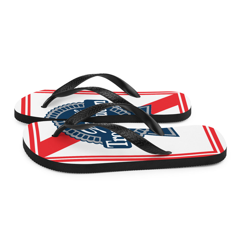 Prepare for an adventurous and carefree summer with a pair of colorful Trophy Queen Blue Ribbon logo with rubber soles and soft fabric lining these flip flops are sure to make you feel comfortable wherever your day takes you.
