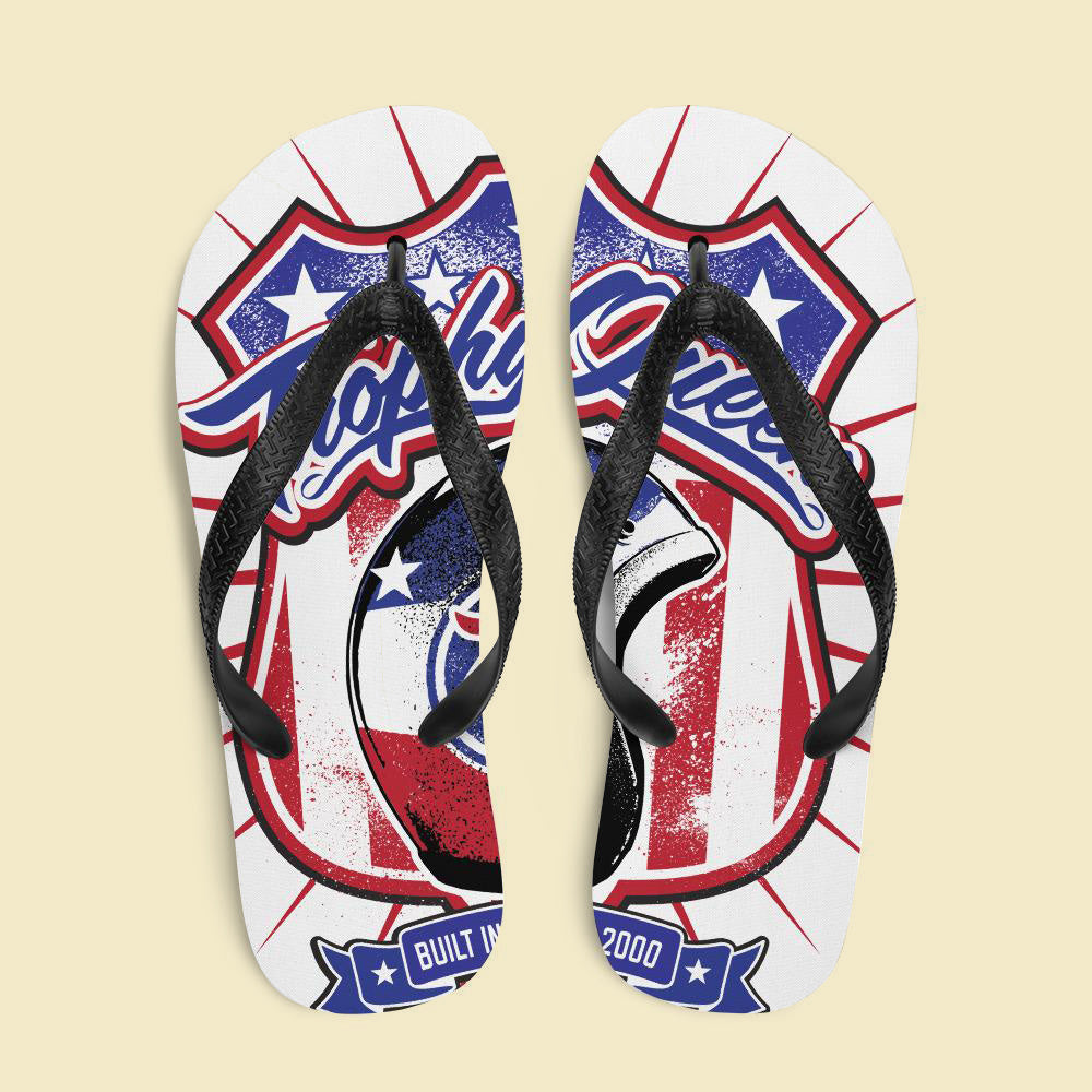 Prepare for an adventurous and carefree summer with a pair of colorful slippers that are created just for you! The perfect beach shoe, these Trophy Queen Helmet Logo by American Artist Keven Carter flip-flops with rubber soles and soft fabric lining these slippers are sure to make you feel comfortable and look cool wherever your day takes you.