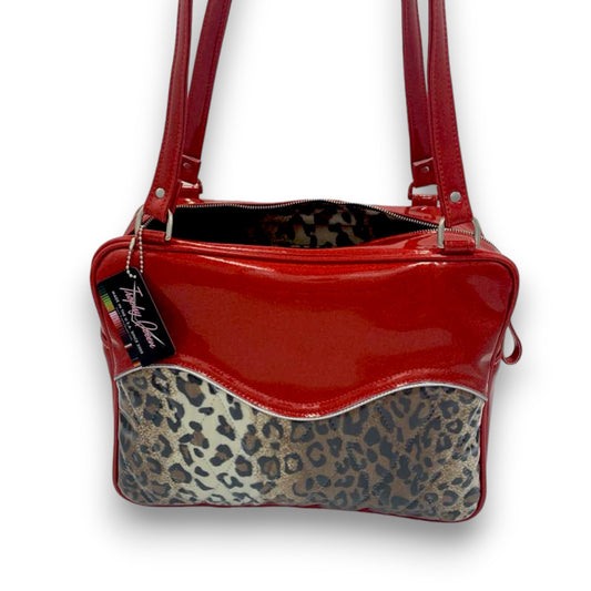 Diamond Pleat Tuck & Roll Business Bag American Made Plush Leopard Lining Dimensions: 15" x 12" x 5” 29" Straps (Approx.) with Nickel Hardware Comes with an Extra Set of Replacement Straps! Inside Zipper Pocket (With Serial Number Inside) Inside Open Divided Pocket Inside Trophy Queen Label Vinyl Zipper Pull Nickel Feet Made to Order - Please Allow 2-3 Weeks to Ship