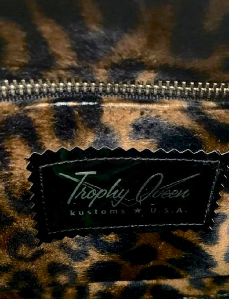 Lincoln Tote in Limited Edition Vintage Gold ‘65 Chevy Fabric and Grease Black Vinyl with Plush Leopard Lining. Made from NOS Vintage 1965 Chevy Upholstery Fabric with matching vinyl zipper pull, nickel feet, inside zipper pocket with serial number and open divided pocket with signature Trophy Queen label. The straps are approximately 25” and come with an extra set of replacement straps. Locally made and ships from California
