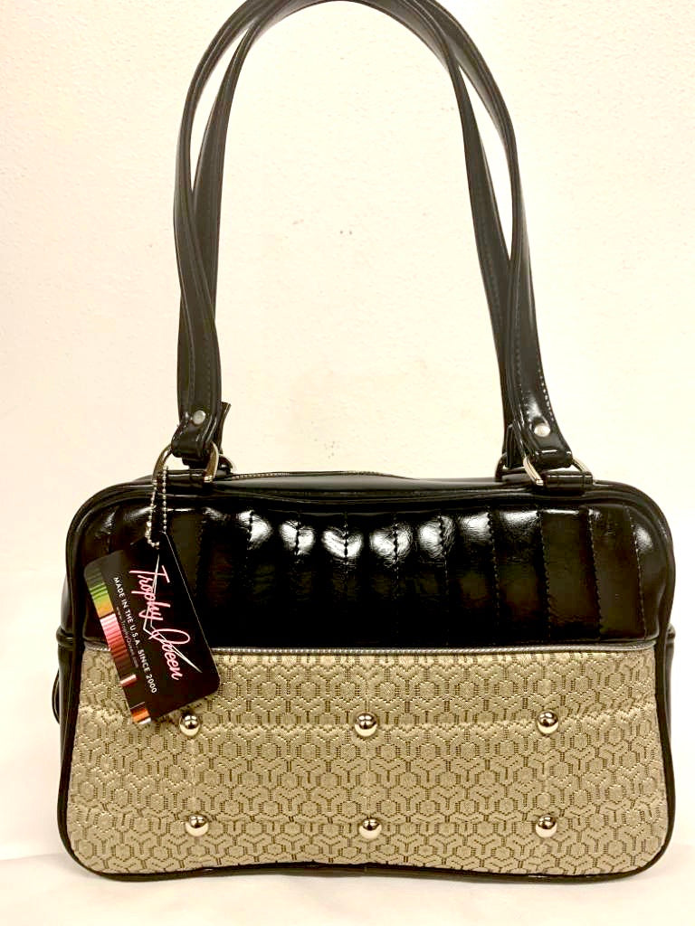 Lincoln Tote in Limited Edition Vintage Gold ‘65 Chevy Fabric and Grease Black Vinyl with Plush Leopard Lining. Made from NOS Vintage 1965 Chevy Upholstery Fabric with matching vinyl zipper pull, nickel feet, inside zipper pocket with serial number and open divided pocket with signature Trophy Queen label. The straps are approximately 25” and come with an extra set of replacement straps. Locally made and ships from California