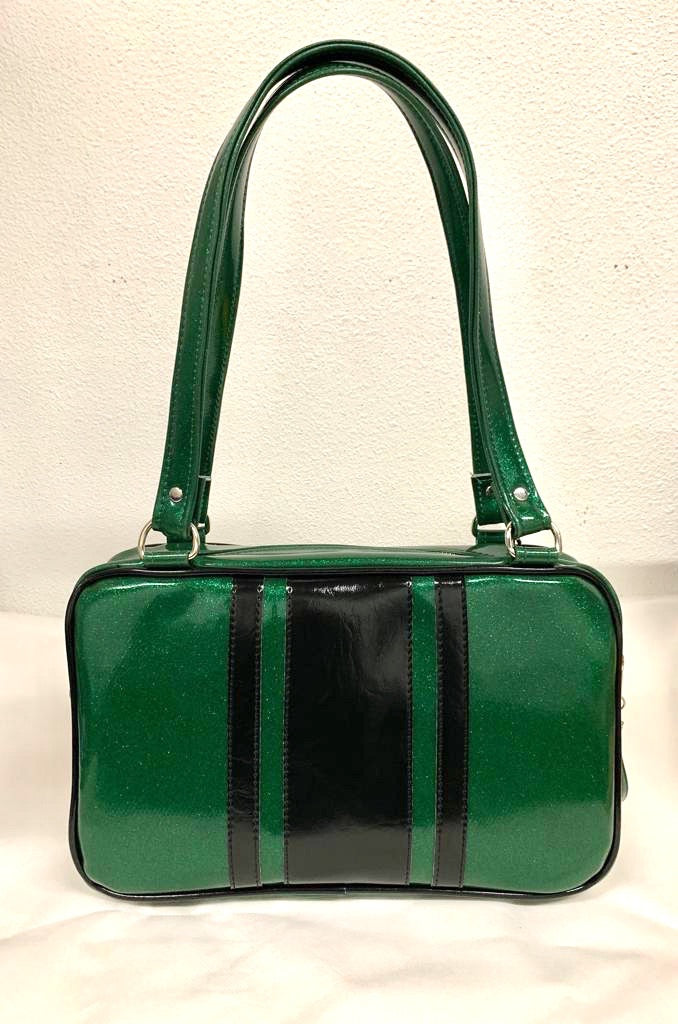 The Galaxy Tote Bag is slightly larger than the Galaxy Shoulder Bag in Green Glitter Vinyl and Grease Black Vinyl Stripes with Plush Leopard Lining. Made with nickel hardware and nickel feet, vinyl zipper pull, and 25” (61cm) straps. Inside you’ll find an open divided pocket, a zipper pocket with serial number inside and signature Trophy Queen Label. Ships from California with an extra set of replacement straps included.