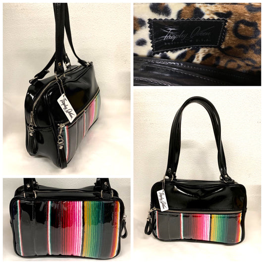 Fairlane Tote Bag in Genuine Mexican Blanket with Clear Overlay and Grease Black Vinyl with plush Leopard Lining. This purse has matching vinyl zipper pull, nickel feet, inside zipper pocket with serial number and open divided pocket with signature Trophy Queen label. The straps are approximately 25” and come with an extra set of replacement straps. Locally made and ships from California.