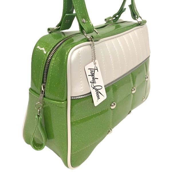 Lincoln Tote in Lime Green Glitter and Pearl White Vinyl with Plush Leopard Lining. Matching vinyl zipper pull, nickel feet, inside zipper pocket with serial number and open divided pocket with signature Trophy Queen label. The straps are approximately 25” and come with an extra set of replacement straps. Locally made and ships from California