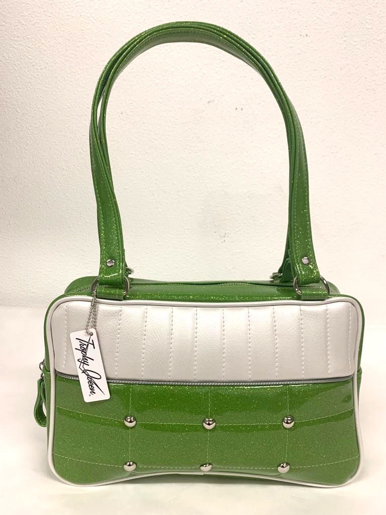 Lincoln Tote in Lime Green Glitter and Pearl White Vinyl with Plush Leopard Lining. Matching vinyl zipper pull, nickel feet, inside zipper pocket with serial number and open divided pocket with signature Trophy Queen label. The straps are approximately 25” and come with an extra set of replacement straps. Locally made and ships from California